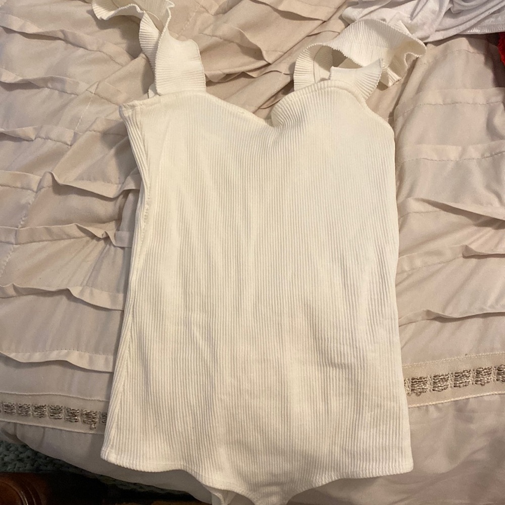 White ruffle body suit